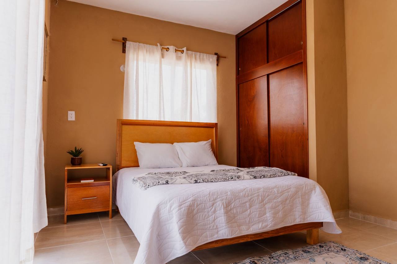 Interior de una suite en Hotel Maya Suites